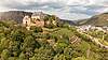 bild Aerial view of Ebernburg castle on a hill overlooking the surrounding landscape.